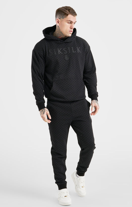 Pantalones Messi x SikSilk Negros Monograma Puños