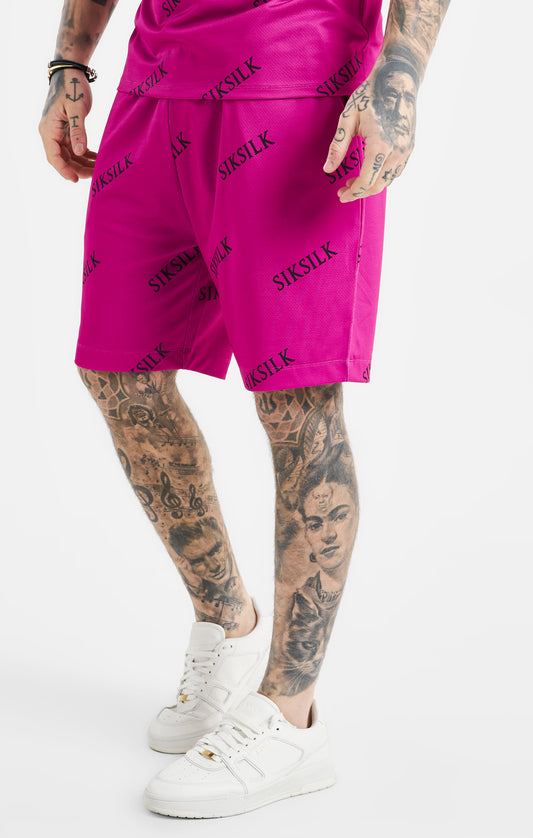 Conjunto De Camiseta Rosa Y Shorts Ajustados Con Logo